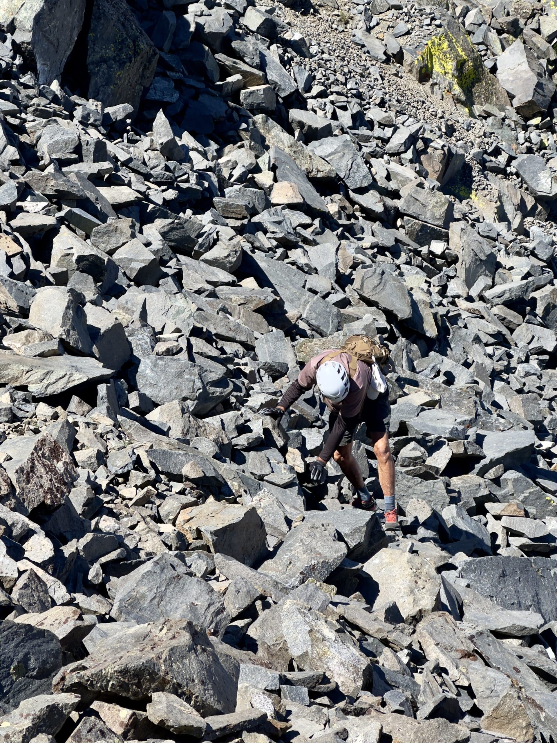 Scott Picking His Way Up the Talus